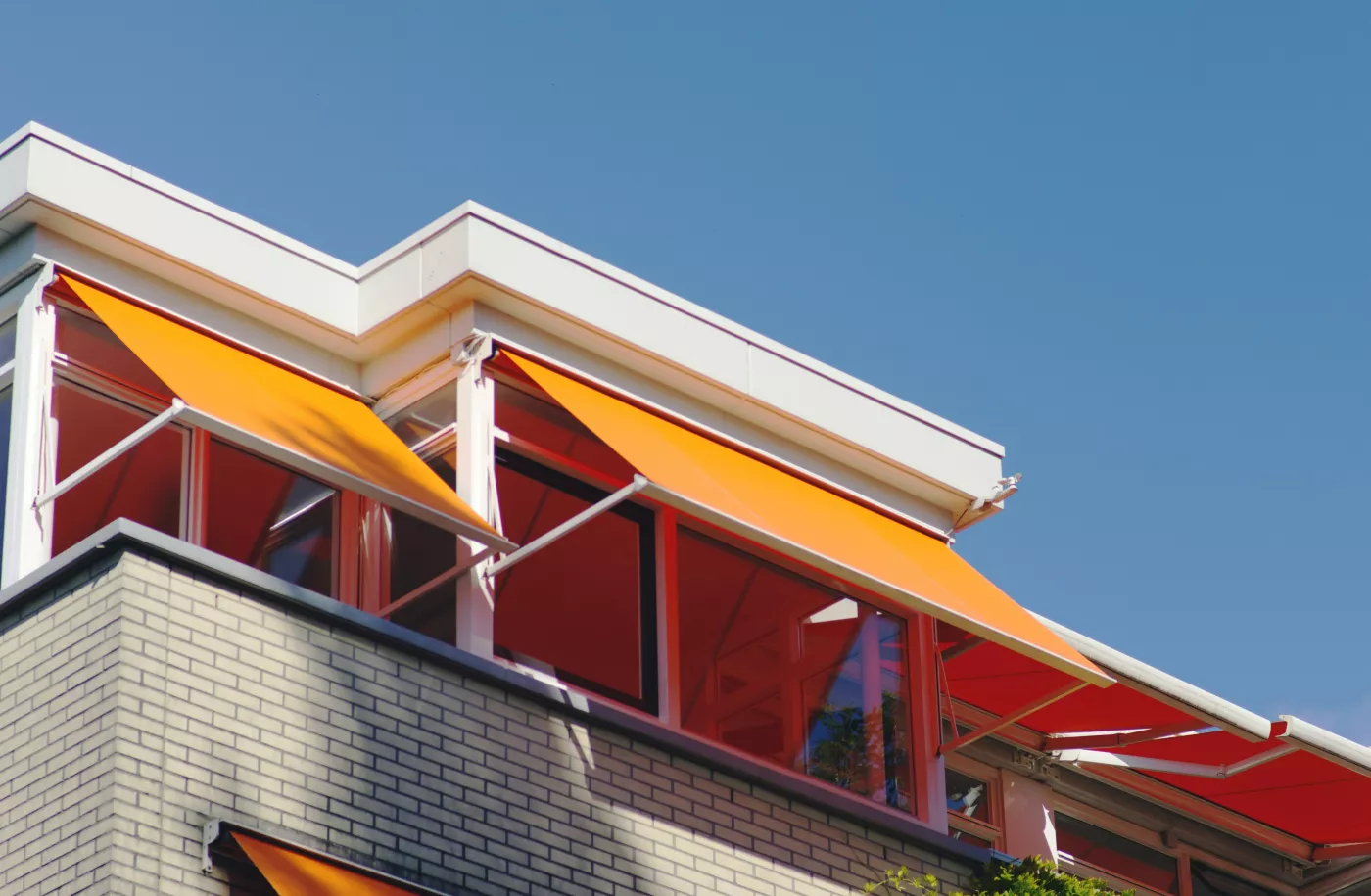Zonnescherm en groen houden huis koel
